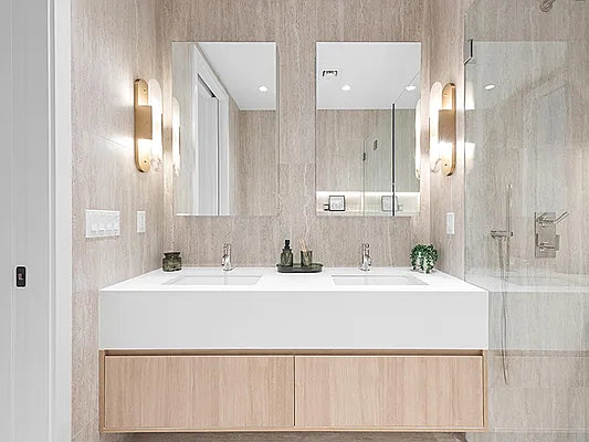 Contemporary bathroom with double sink wood vanity and marble countertop