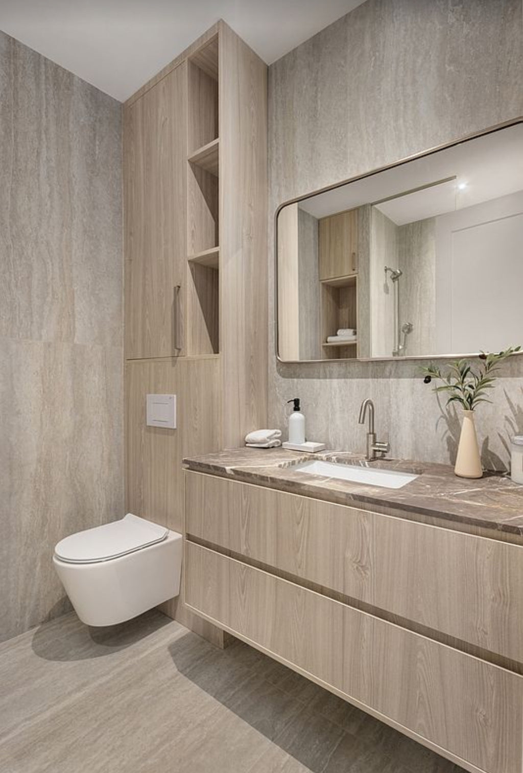 Contemporary powder room with wood vanity and marble countertop